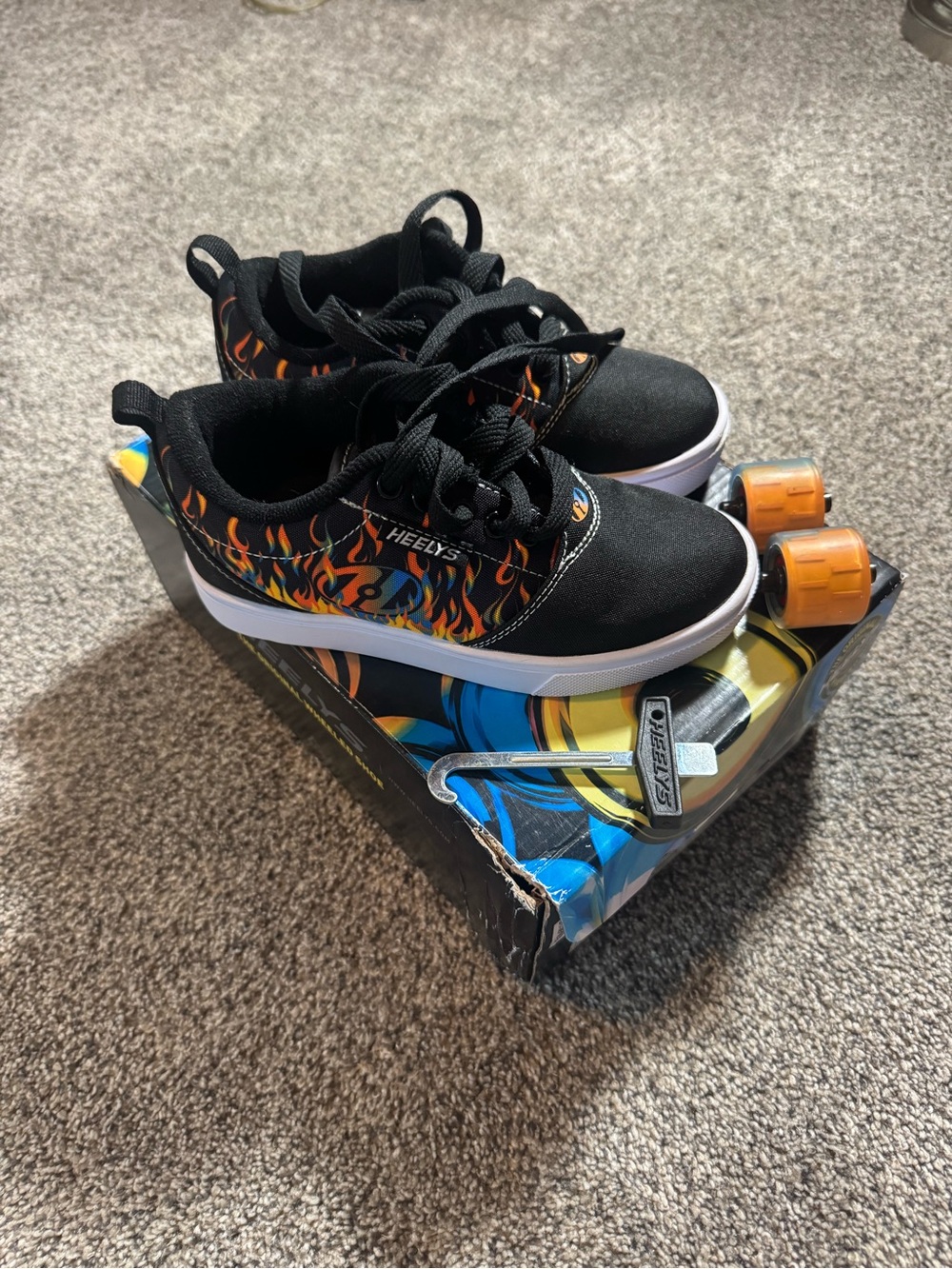 Heelys Kids Black Sneakers with Orange Flame Design